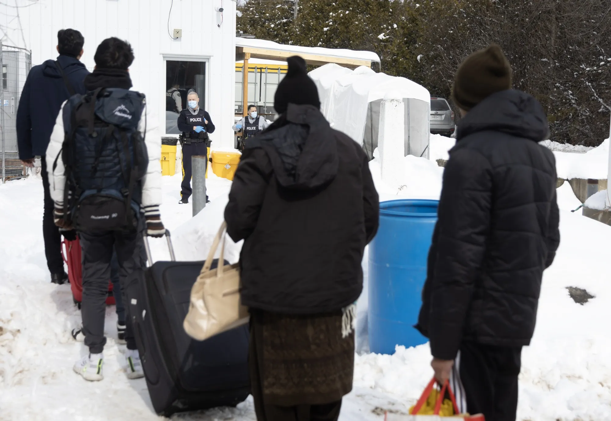 Influx of Asylum Seekers Surprises Canada and Cities Bear the Cost ...