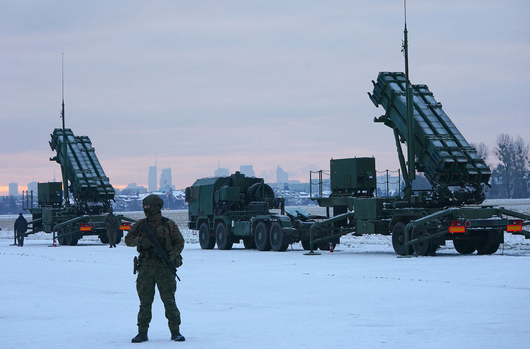 A soldier stands in front of Patriot&nbsp;surface-to-air missile systems during a military exercise at Warsaw Babice Airport, Poland on Feb. 7.&nbsp;