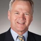 Headshot of John M Stephen