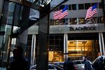 Pedestrians pass in front of BlackRock Inc. headquarters in New York, U.S., on Friday, Jan. 11, 2019.