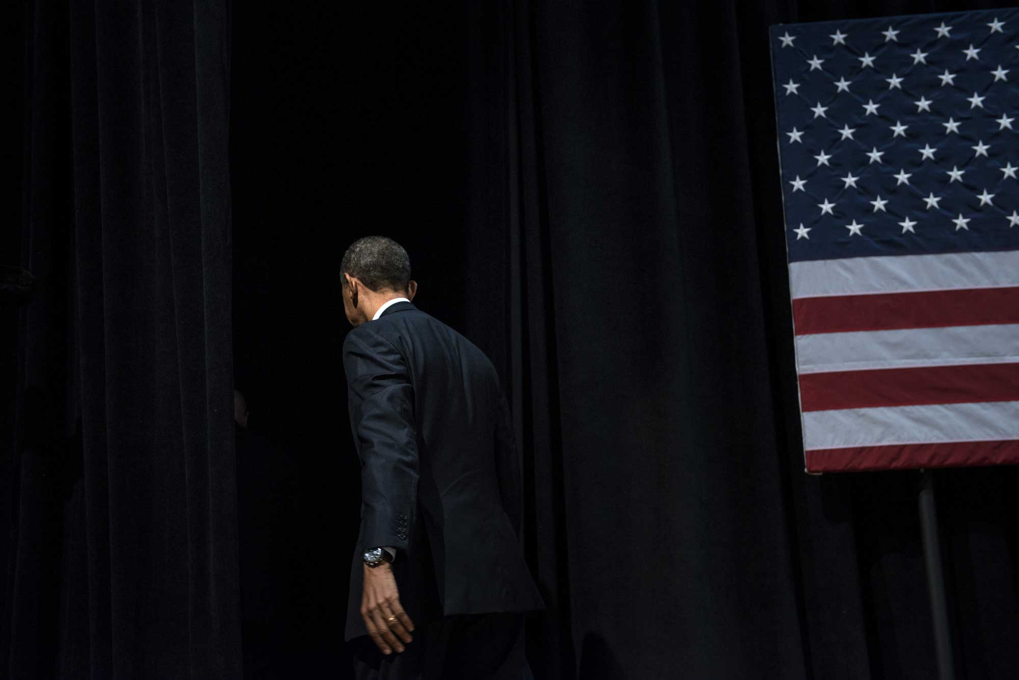 President Obama walking off stage.
