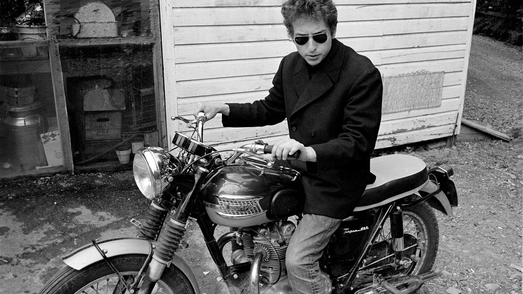 Channeling Dylan on that vintage motorbike doesn't have to be hard. The key is to prepare. Here's what we recommend for the coolest - and most functional - motorcycle gear this year.&nbsp;Photographer: Douglas R. Gilbert/Redferns/Getty Images