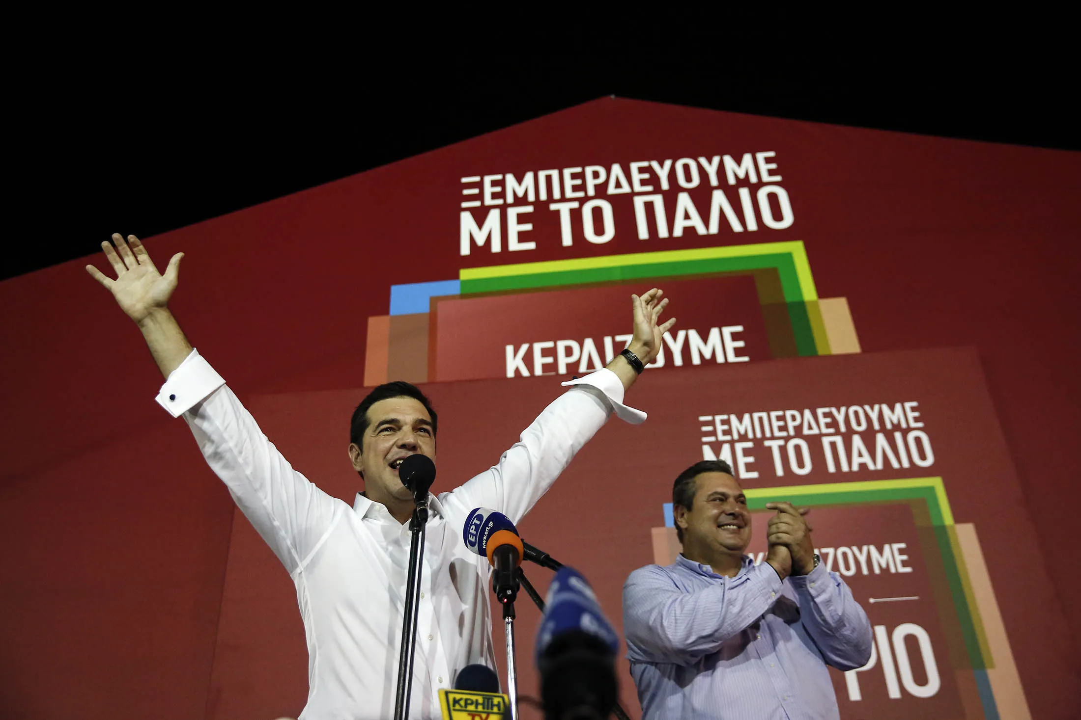 Alexis Tsipras, Greece's prime minister, celebrates as he secures victory in the general election in Athens on Sunday.
