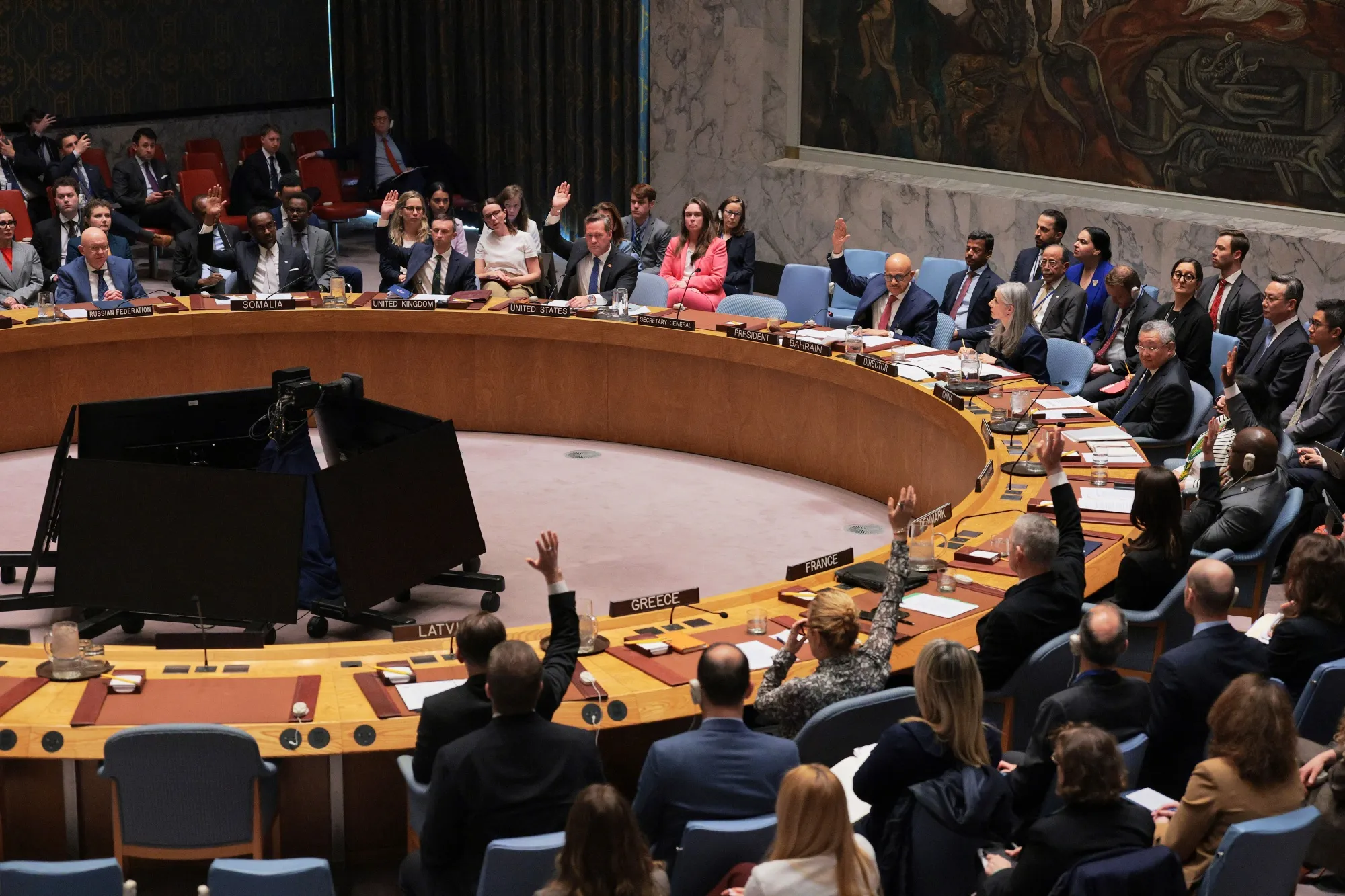 Members of the United Nations Security Council vote on a draft resolution regarding the situation in the Middle East on April 7 in New York.