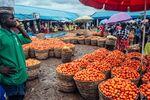 Vendors sell fresh tomatoes at Orange Market in Mararaba, Nigeria.