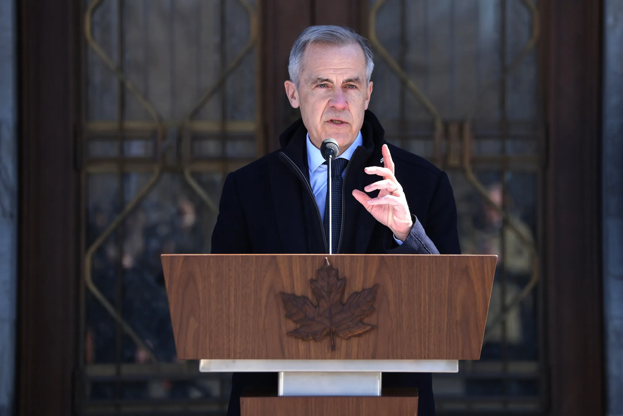 Mark Carney speaks during a news conference in Ottawa, Ontario, Canada, on Sunday.