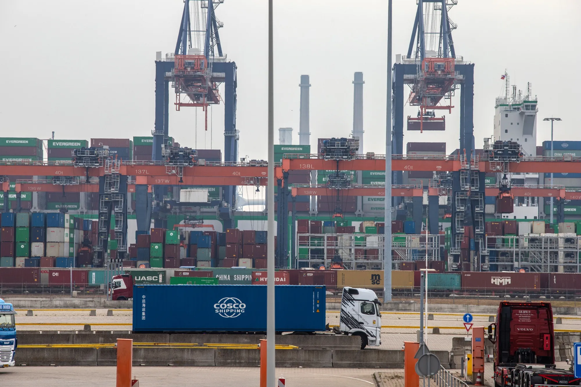 A truck&nbsp;transports a shipping container at the Port of Rotterdam in Rotterdam, Netherlands.