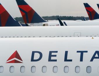 relates to An emergency slide falls off a Delta Air Lines plane, forcing pilots to return to JFK in New York
