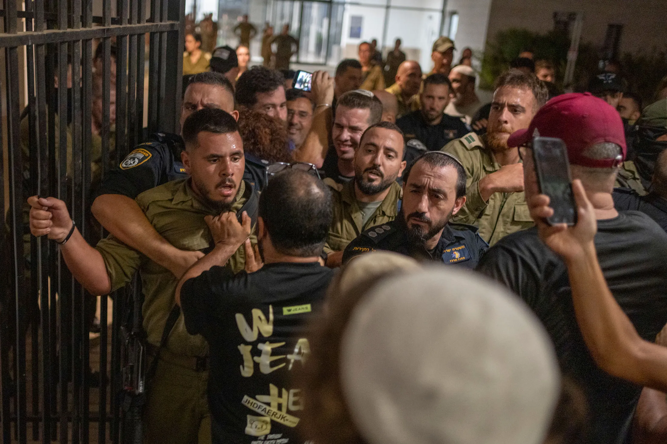 Soldiers and police clash with protesters at Beit Lid military base in Israel on July 29.
