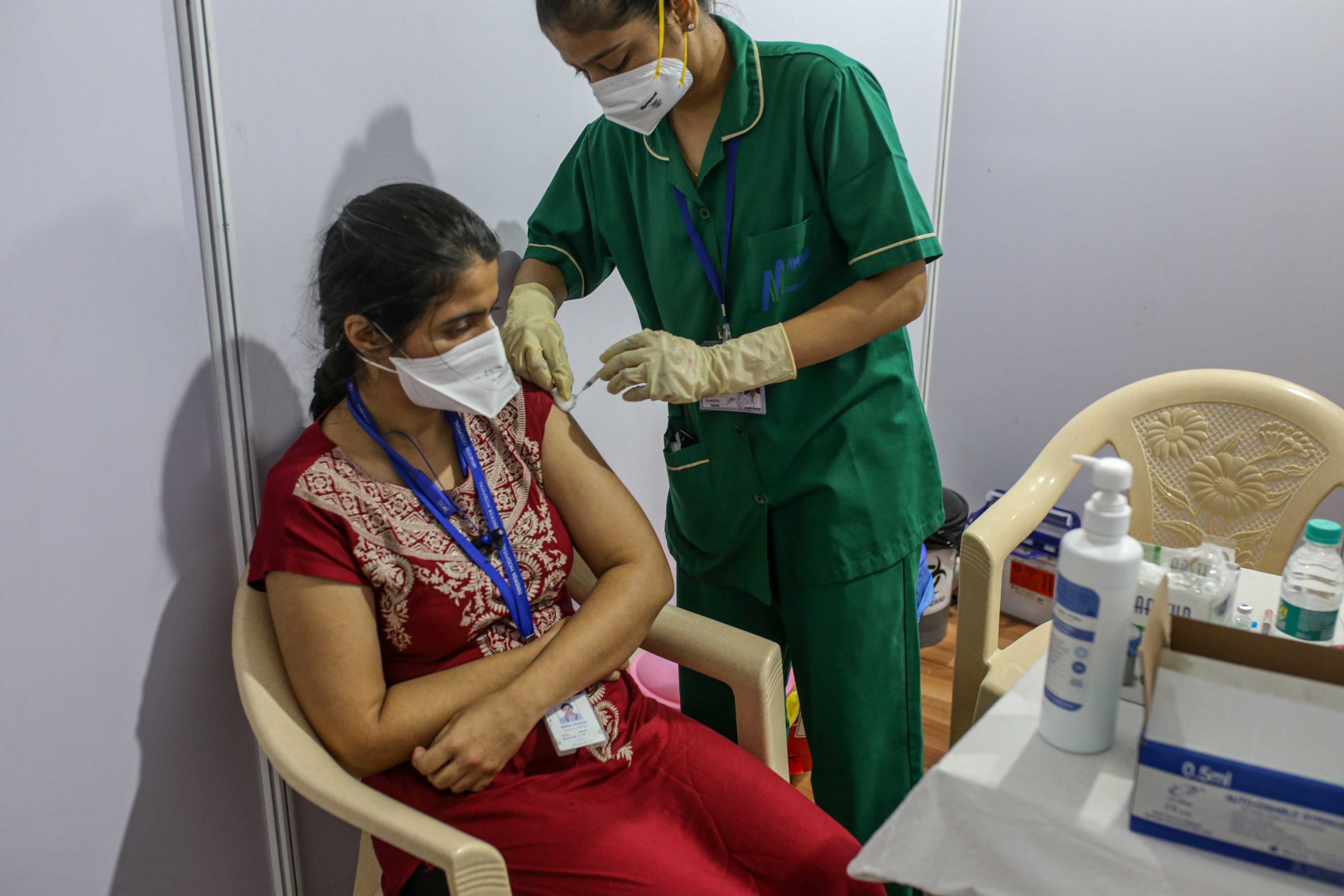 A nurse administers a shot of the Covishield vaccine in Mumbai, on Jan. 16.