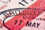Close up of visa stamp on passport page