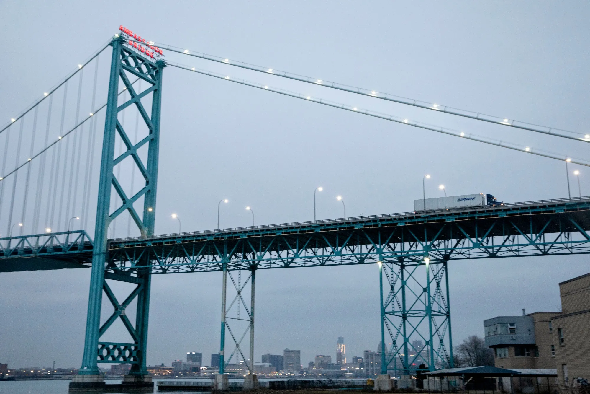 A tractor trailer drives across the Ambassador Bridge on the Canada-US border in Windsor, Ontario, Canada, on&nbsp;Dec. 26, 2024.