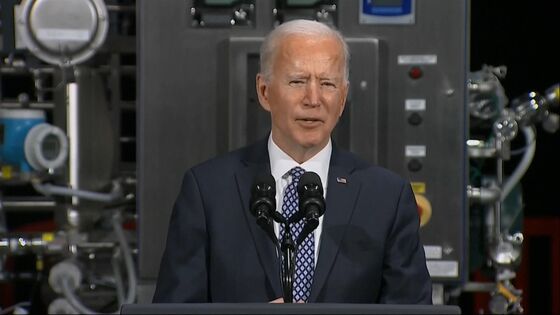 Biden Slams Trump’s Vaccine Record as He Tours Pfizer Plant