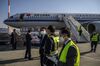 Medical supplies sit in front of an Air China aircraft at Athens Eleftherios Venizelos International Airport in Greece, March 21.