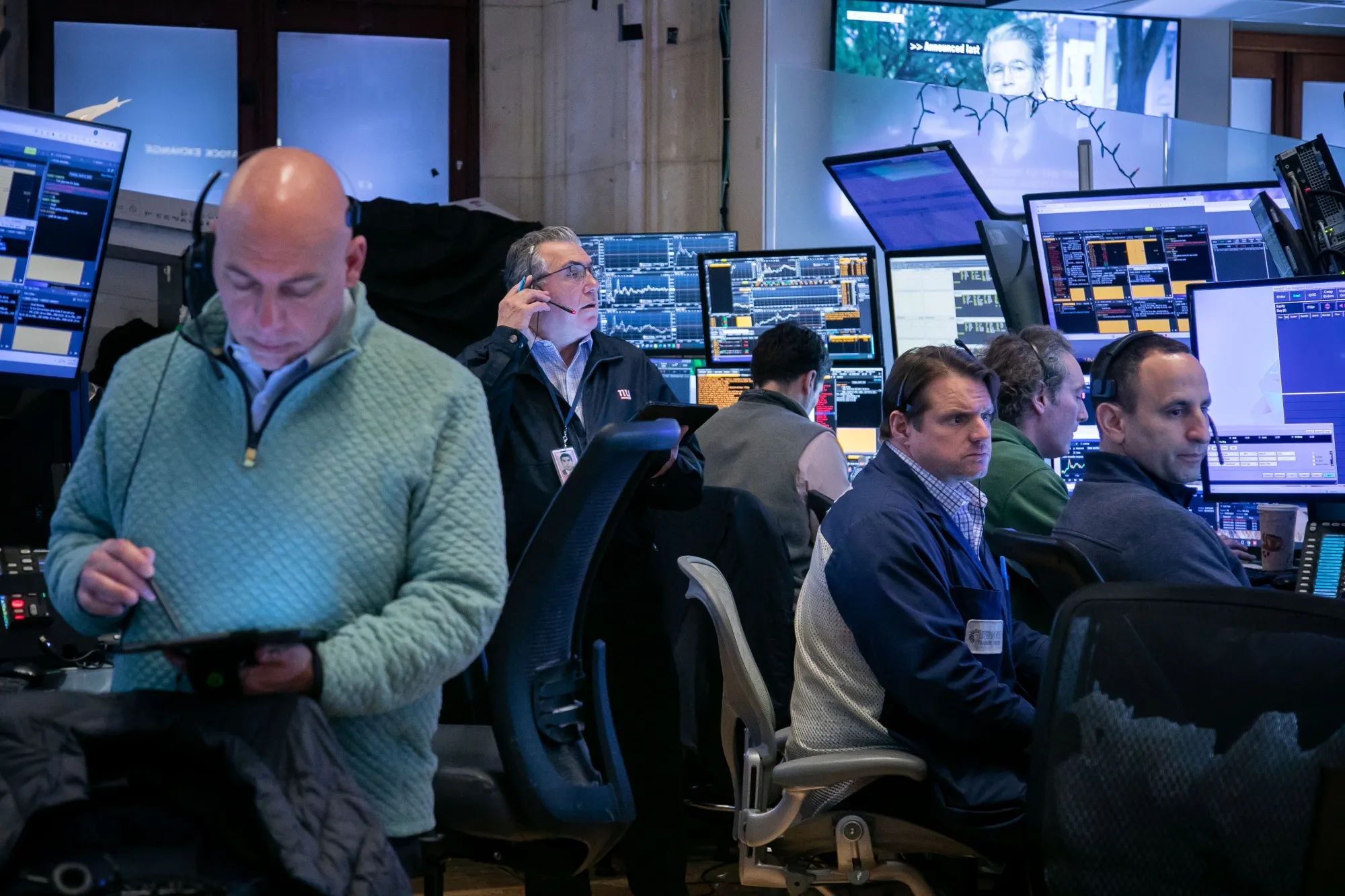 Traders work on the floor of the New York Stock Exchange on April 8.