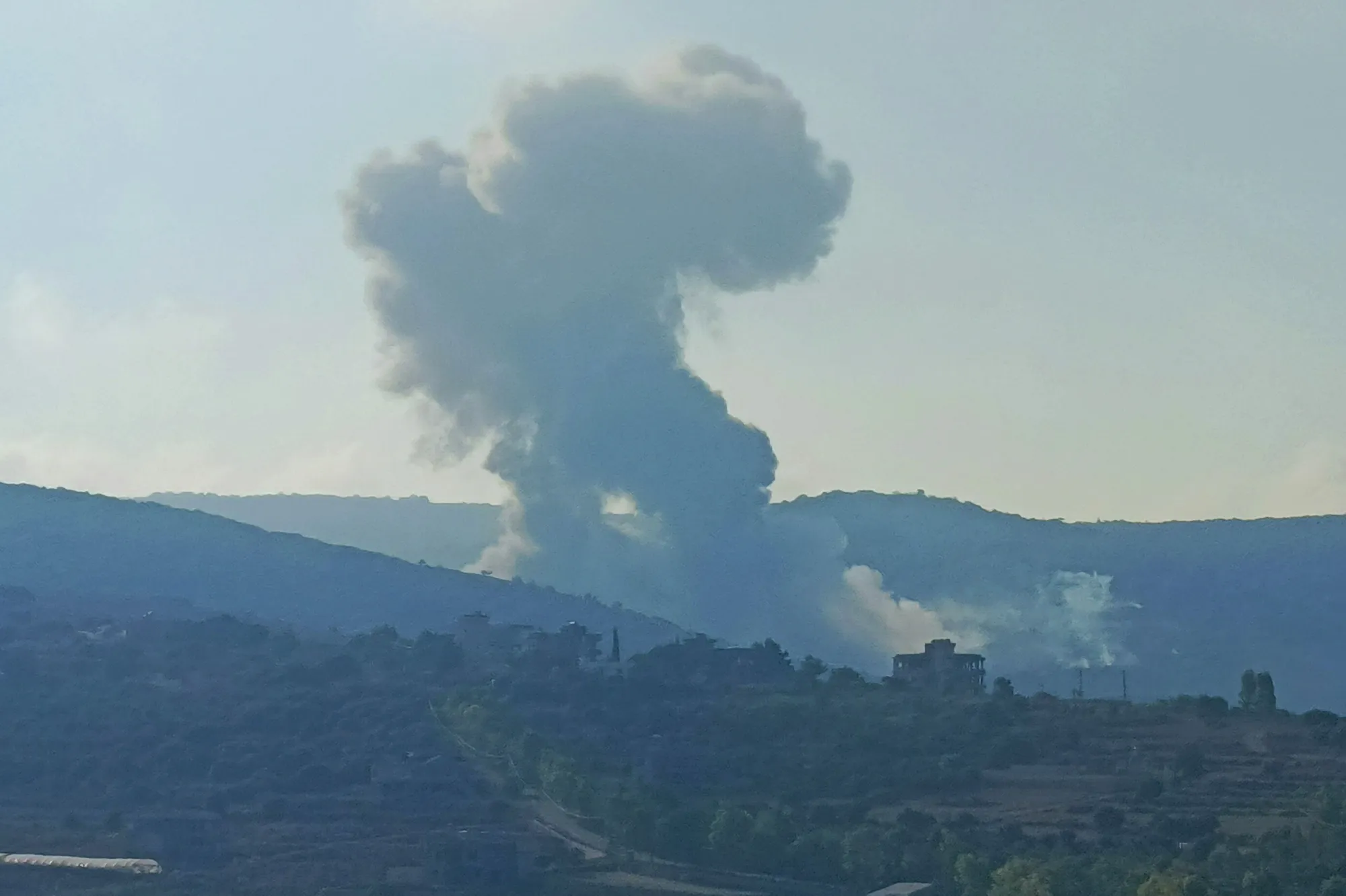 Smoke billows from an area targeted by an Israeli airstrike between the southern Lebanese border villages of Zibqin and Yater on August 25.