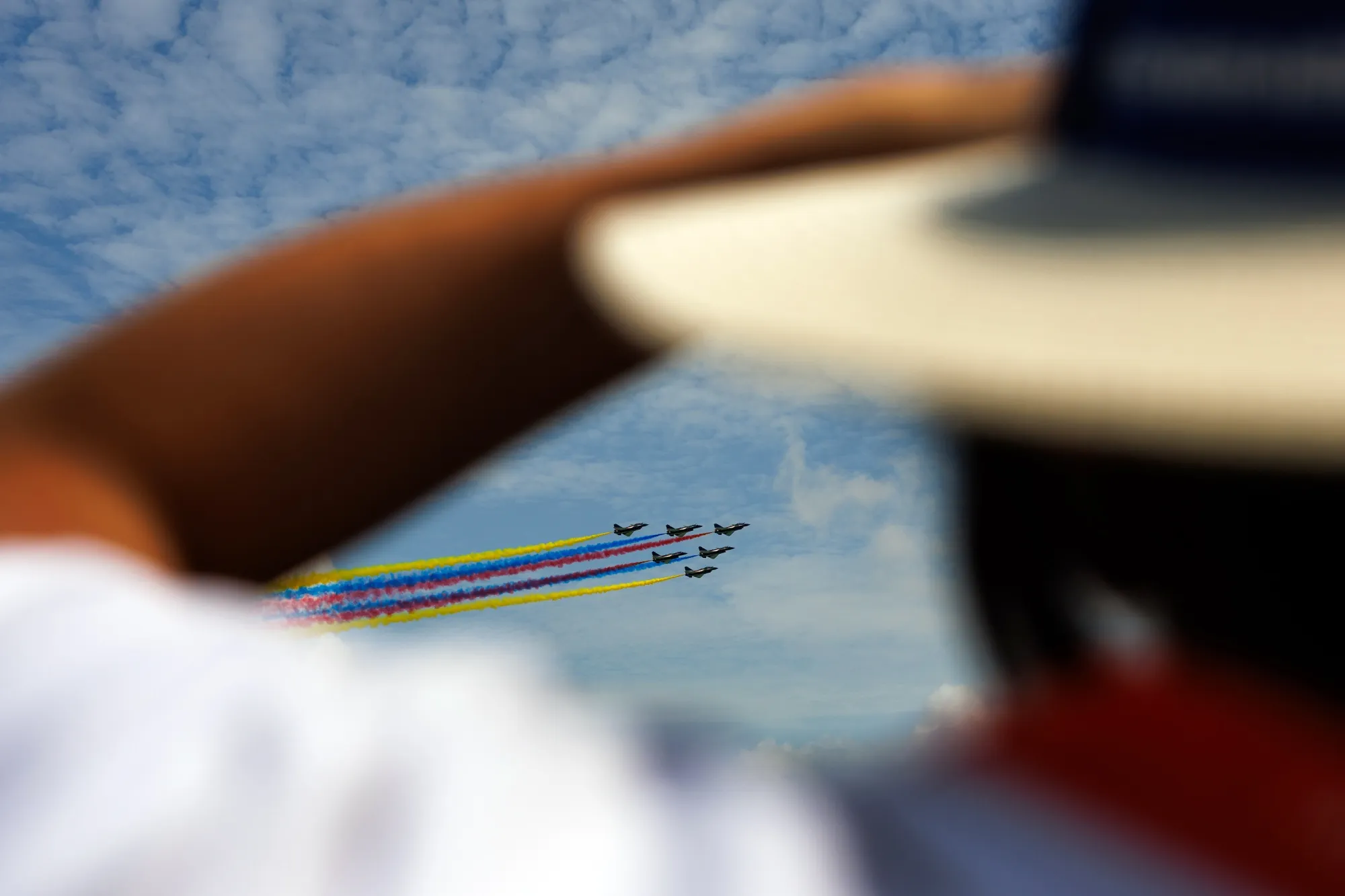 The People’s Liberation Army Air Force Bayi aerobatic team performs during a flying display at the Singapore Airshow.