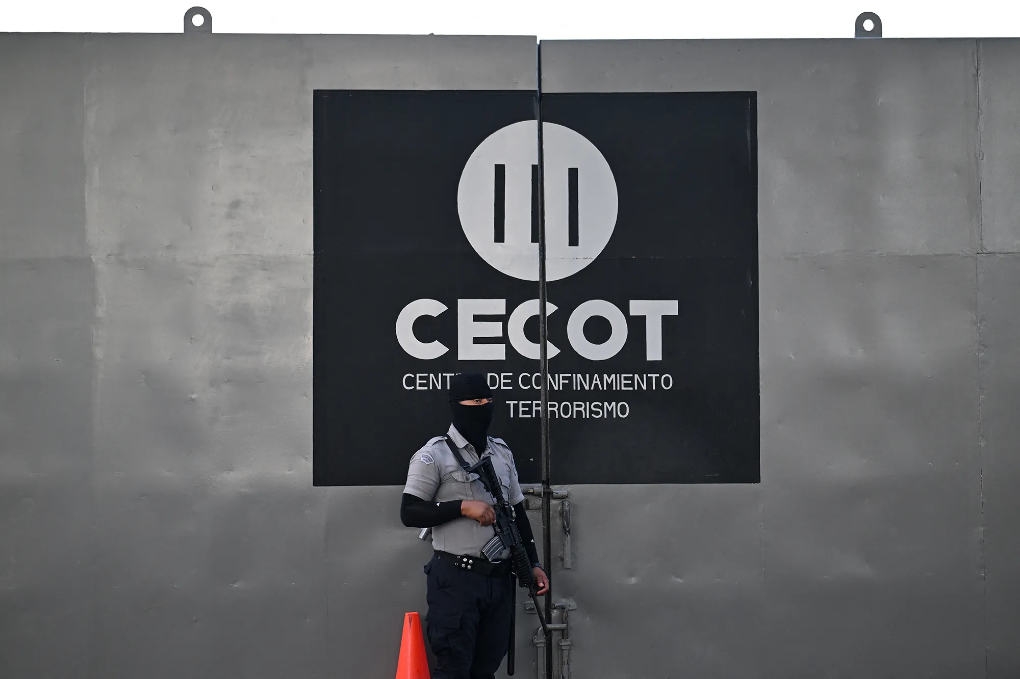 A security officer stands guard at an entrance of the Centre for Terrorism Confinement in Tecoluca, El Salvador on April 4.