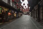 Lanterns hang at the near empty Yuyuan Bazaar in Shanghai on Feb. 7.