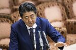 Shinzo Abe, Japan's prime minister, speaks in the upper house of parliament in Tokyo.