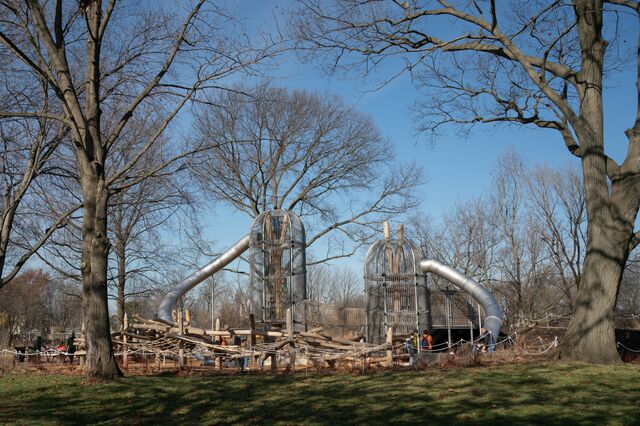 Custom-designed  “birdhouse”  structures with slides and climbing areas at the Anna C. Verna Playground.