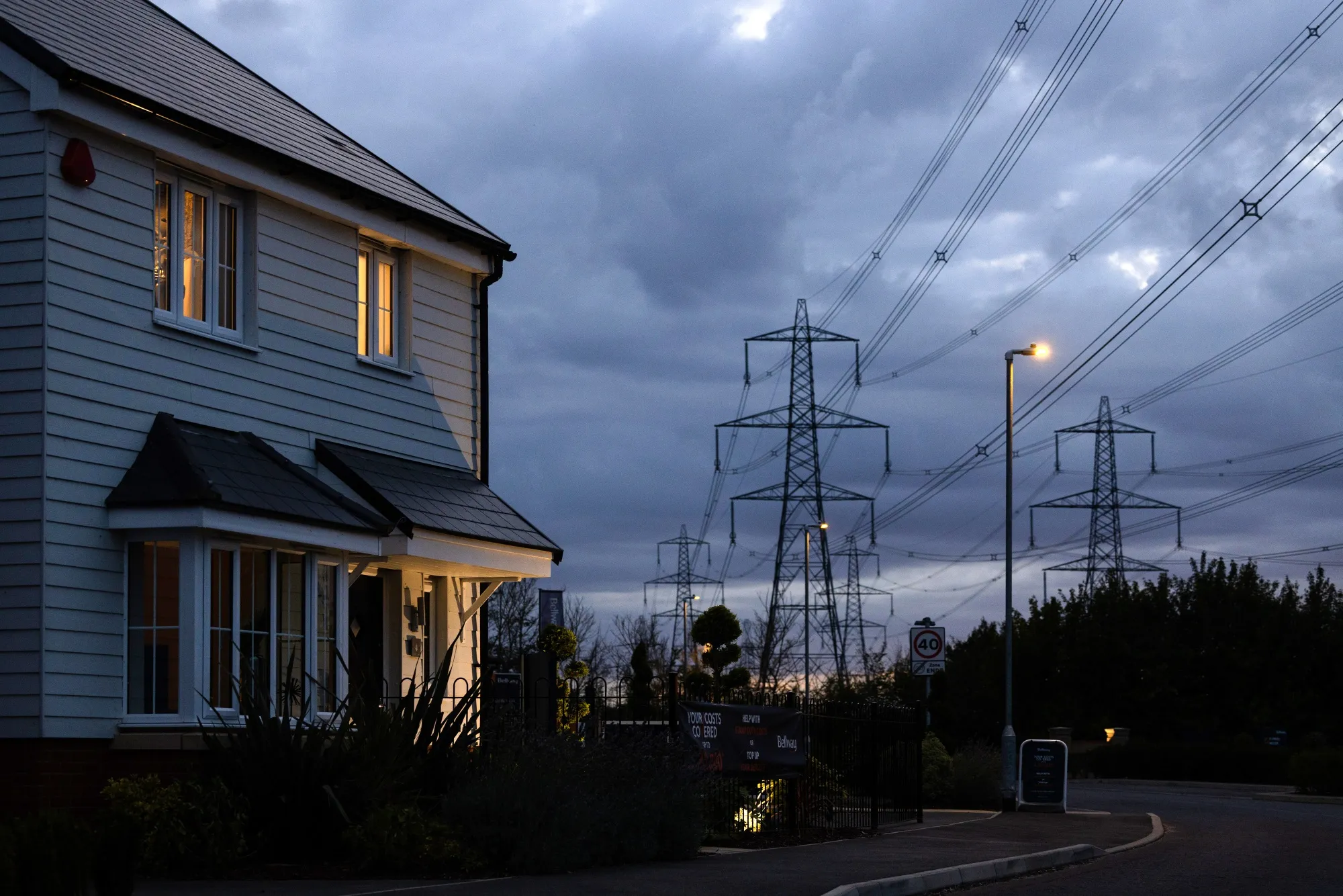 A new home next to electricity pylons in Bramford, UK.