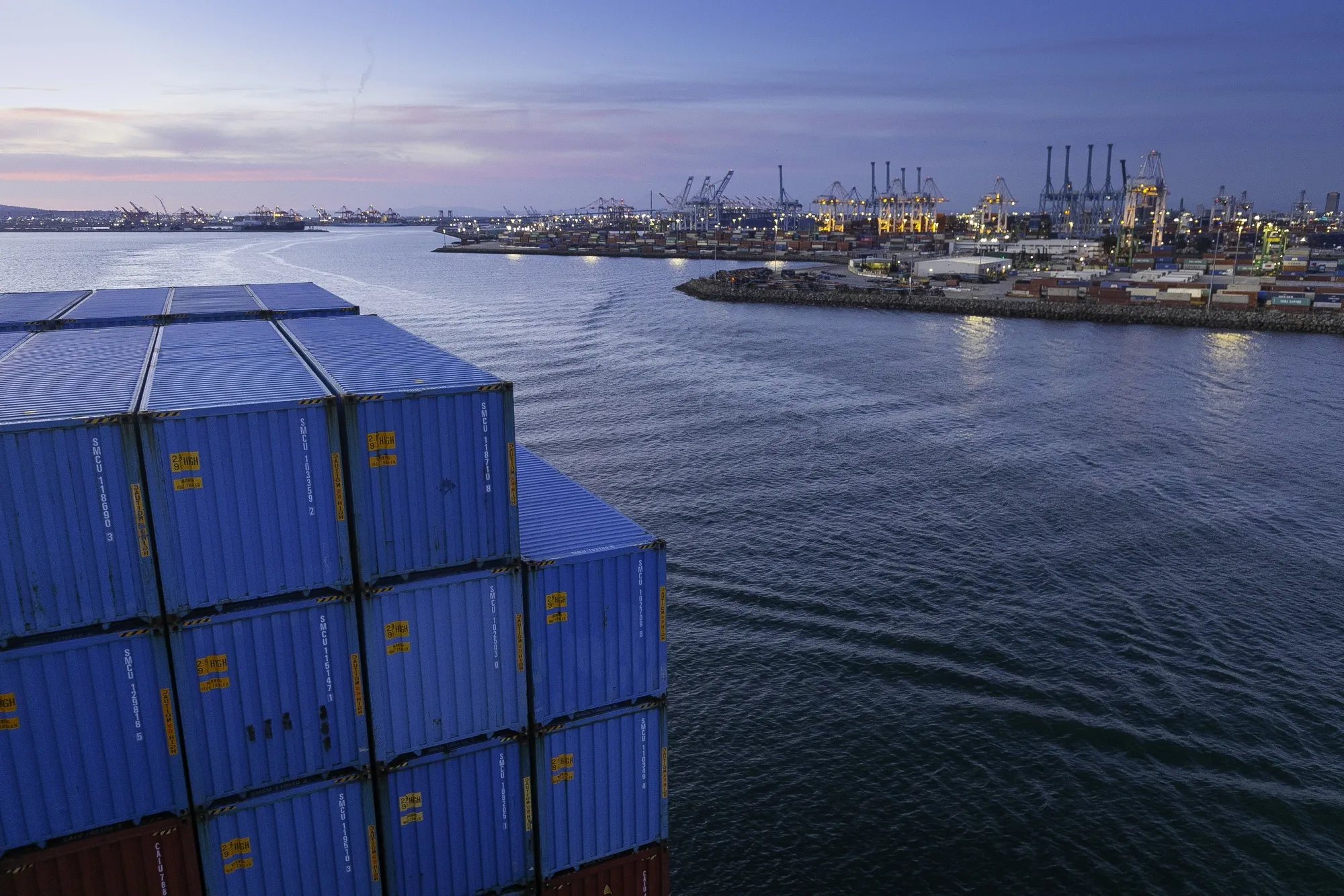 A container ship departs the Port of Long Beach.