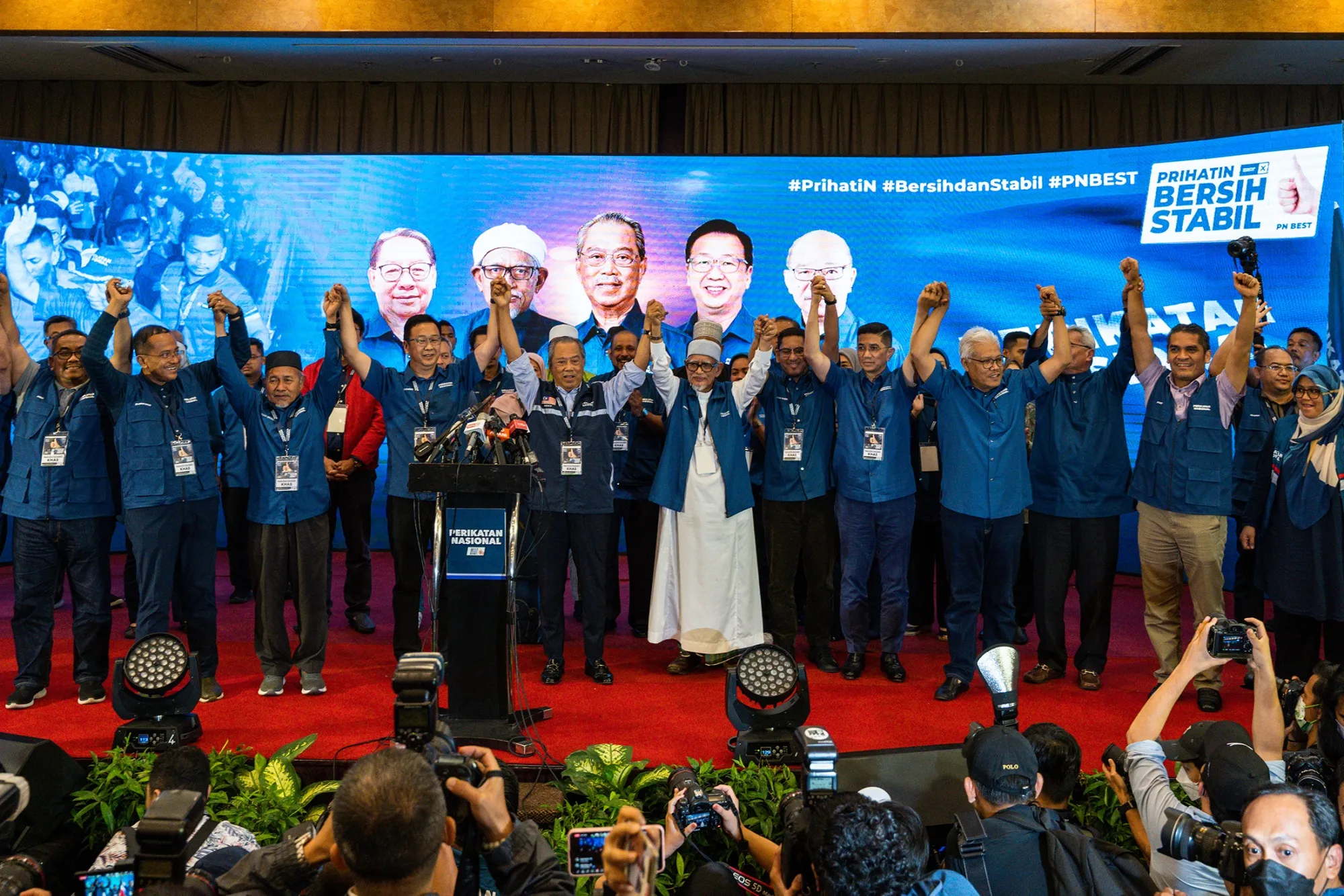 Muhyiddin Yassin, center, celebrates with party members in Shah Alam, on May 20. 