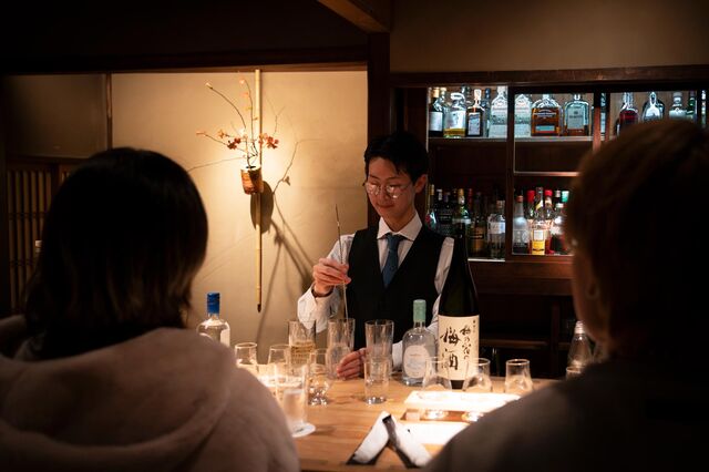 A bartender prepares a drink at Ixey Bar.