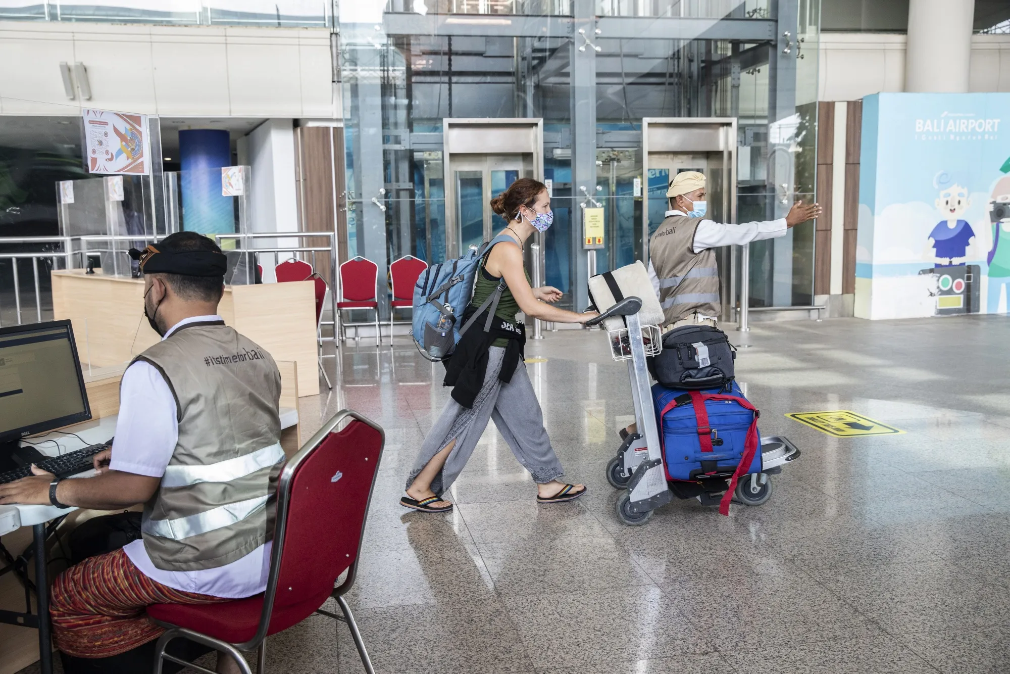 A traveler arrives at Ngurah Rai International Airport in Bali, Indonesia.