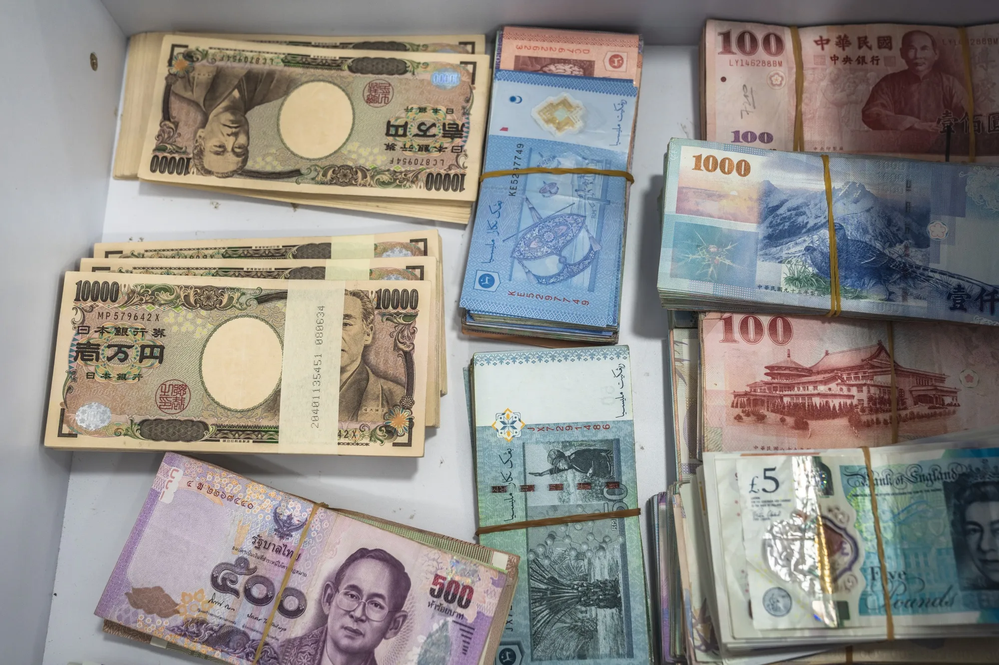 The Thai baht slipped as much as 0.8% against the dollar, while the Malaysian ringgit and South Korean won also weakened.&nbsp;
