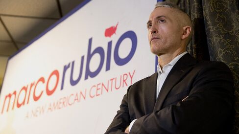Representative Trey Gowdy of South Carolina listens to Senator Marco Rubio speak in Pella, Iowa, on Dec. 30, 2015.