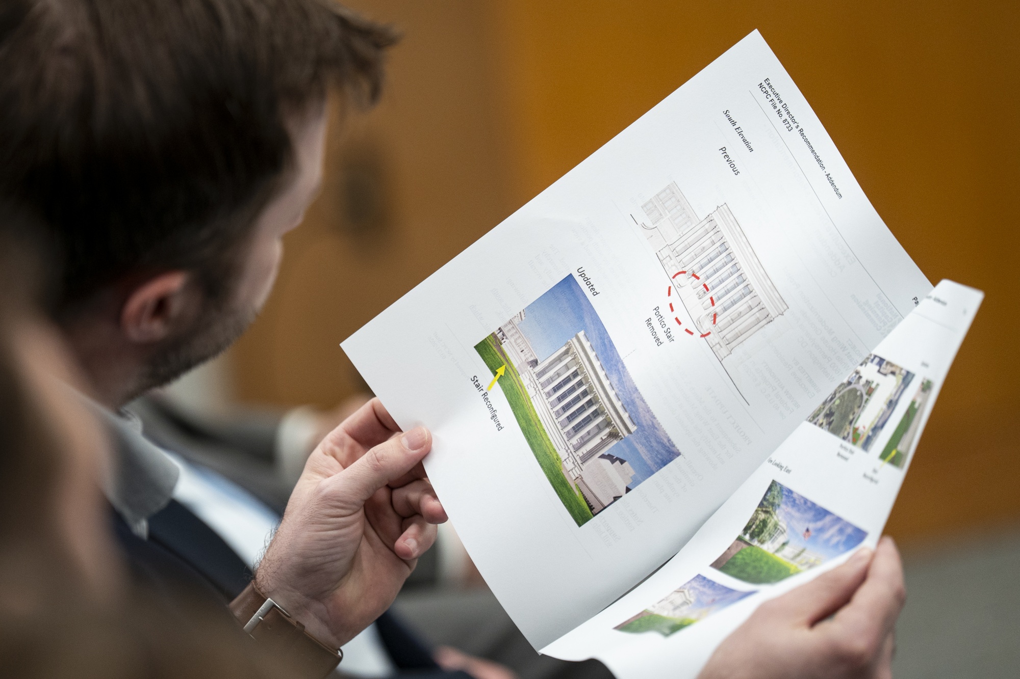 WASHINGTON, DC - APRIL 2: An attendee looks at an updated design for the new $400 million ballroom at the White House prior to a vote on the proposal by the National Capital Planning Commission, on April 2, 2026 in Washington, DC. A federal judge issued a preliminary injunction and temporarily blocked President Donald Trump from moving ahead with any further construction on a new ballroom on the former site of the White House East Wing.(Photo by Al Drago/Getty Images)