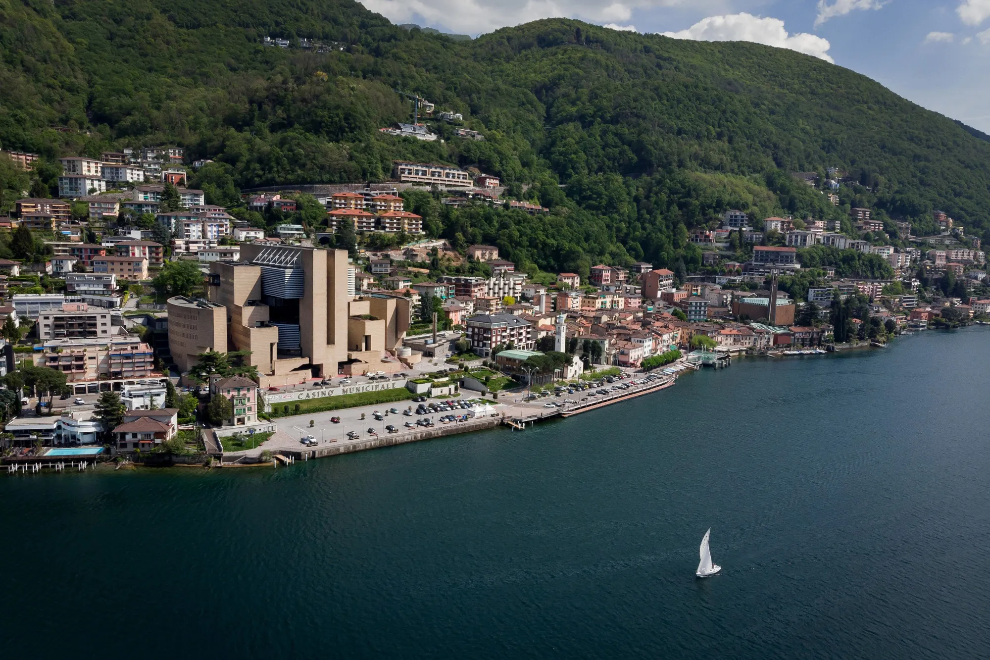 Campione d'Italia with its casino,&nbsp;designed by architect Mario Botta,&nbsp;on the shore&nbsp;of Switzerland's Lake Lugano.