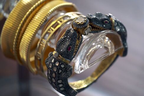 Gleem says Naomi Campbell is a fan of this gold crocodile bangle with 14.42 carats of rough cut diamonds and rubies. $11,220