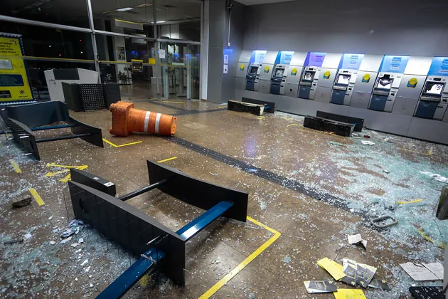 Damage at a bank branch after demonstrations in São Paulo on July 26