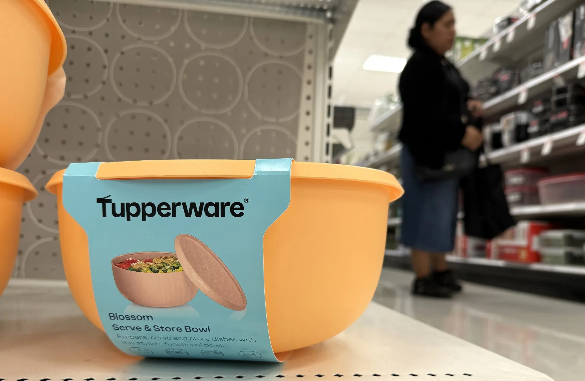 Tupperware food storage products are displayed on a shelf for sale at a store on Sept. 18 in San Rafael, California. Orlando-based food storage company Tupperware filed for Chapter 11 bankruptcy as sales declined.