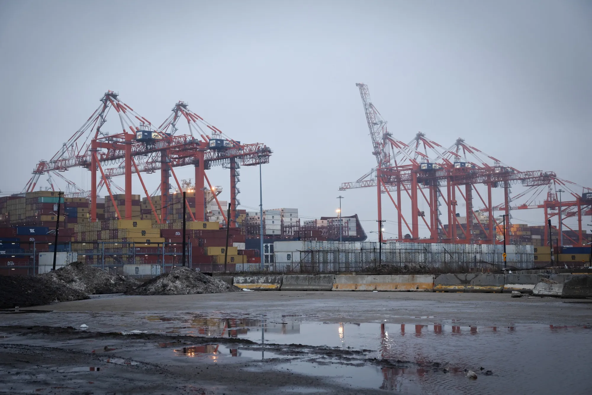 Cranes move containers at the Port of Newark in Newark in Newark, New Jersey.