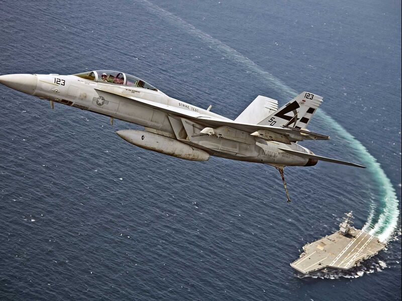 28 JULY 2017 NAS PATUXENT RIVER MD. VX-23 SD123 F/A-18F Pilot LCDR Jamie R. Struck callsign &quot;COACH&quot; makes first carrier arrested landing using new AAG system aboard USN newest carrier CVN78 Gerald R. Ford off the Virgina coast. Official USN photograph by 