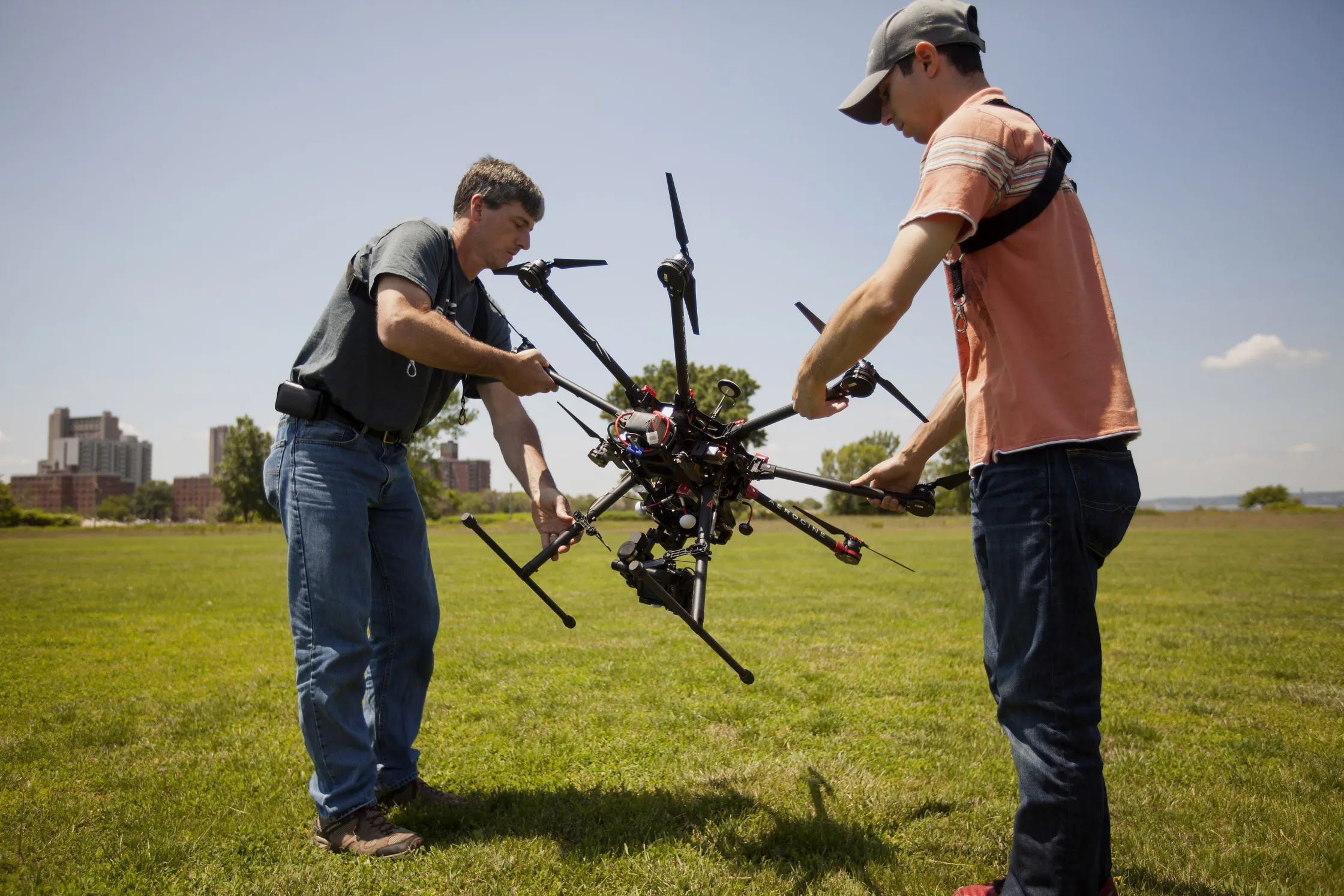 Mike Ferguson, Aerobo pilot, left, and Jeff Brink, company's co-founder prepare for a drone flight in New York. Photographer: Michael Nagle/Bloomberg
