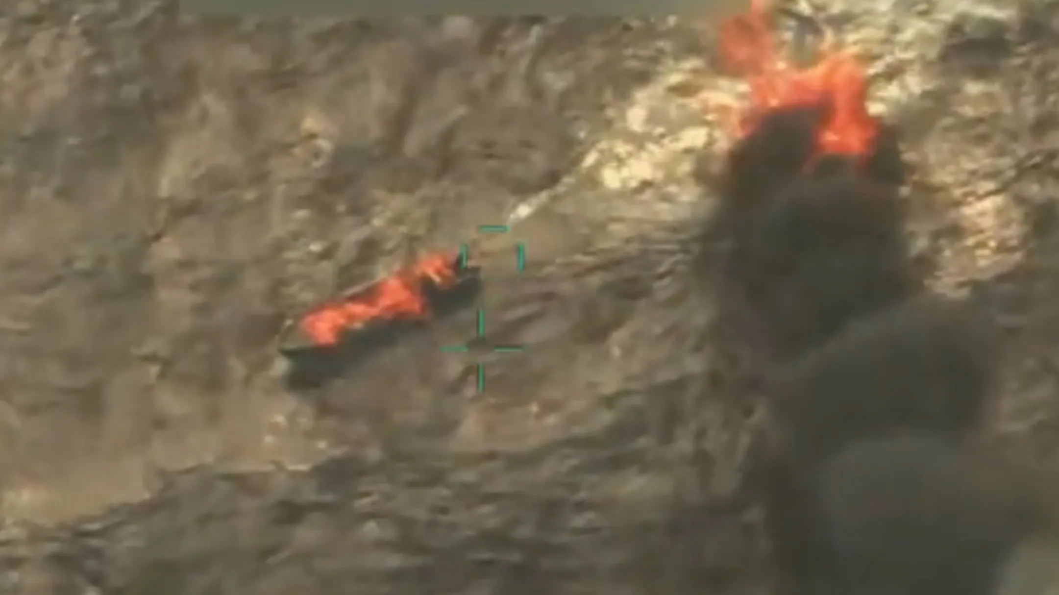A vessel on fire following a US strike from a video posted to President Donald Trump's Truth Social account on Sept. 15.