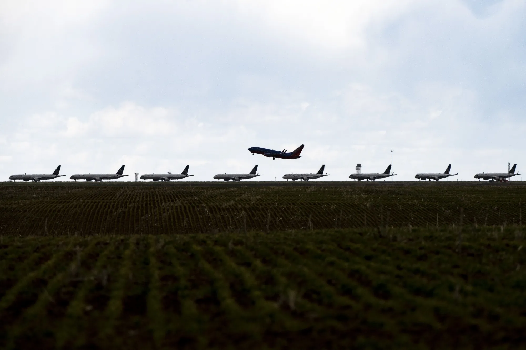 United Planes Sit Parked At Denver International Airport, As The Coronavirus Pandemic Severely Halts Airline Travel
