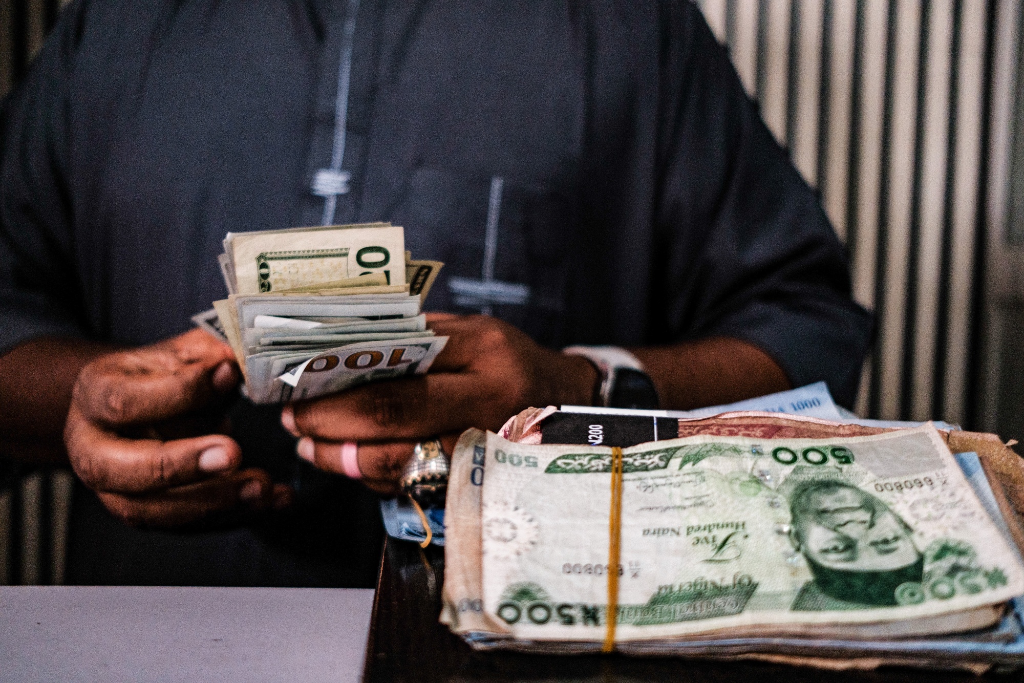 Companies whose valuations were battered by the naira’s fall have since shored up their balance sheets and returned to profitability. Photographer: Victor Adewale/Bloomberg
