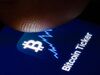 Berlin, Germany - February 27: In this photo illustration the logo of Bitcoin Ticker is displayed on a smartphone on February 27, 2019 in Berlin, Germany. (Photo Illustration by Thomas Trutschel/Photothek via Getty Images)