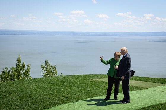 Merkel Defies Political Gravity to Face Trump Again at NATO