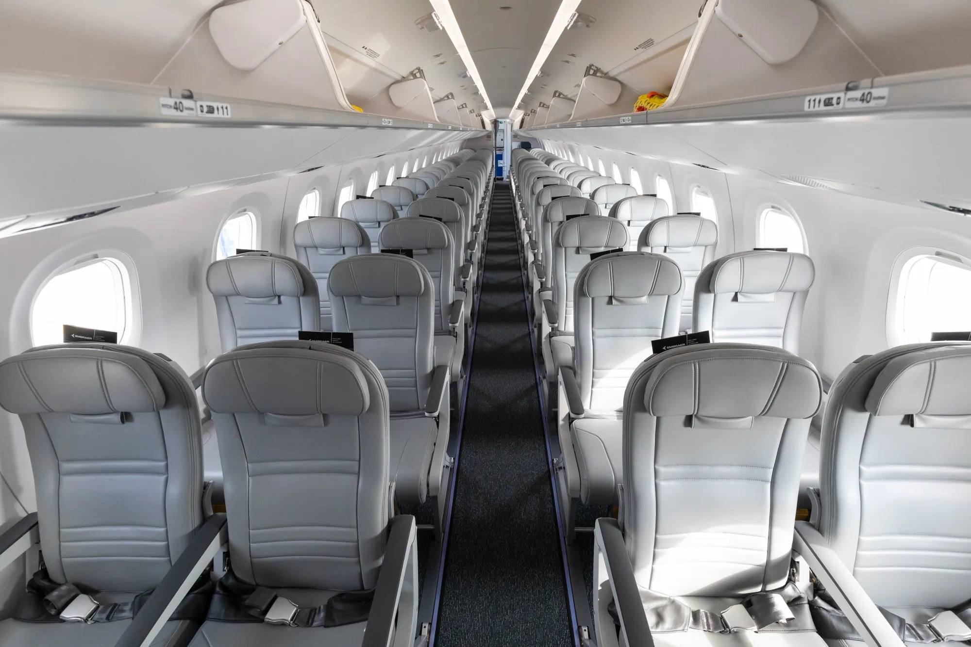 The interior of an Embraer SA 195-E2 aircraft.