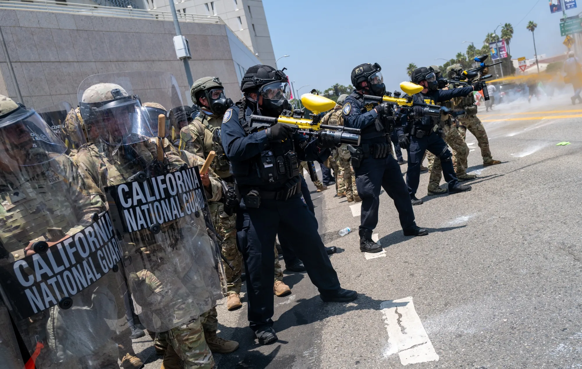 The National Guard, police and protesters stand off outside of a downtown jail in Los Angeles on June 8.