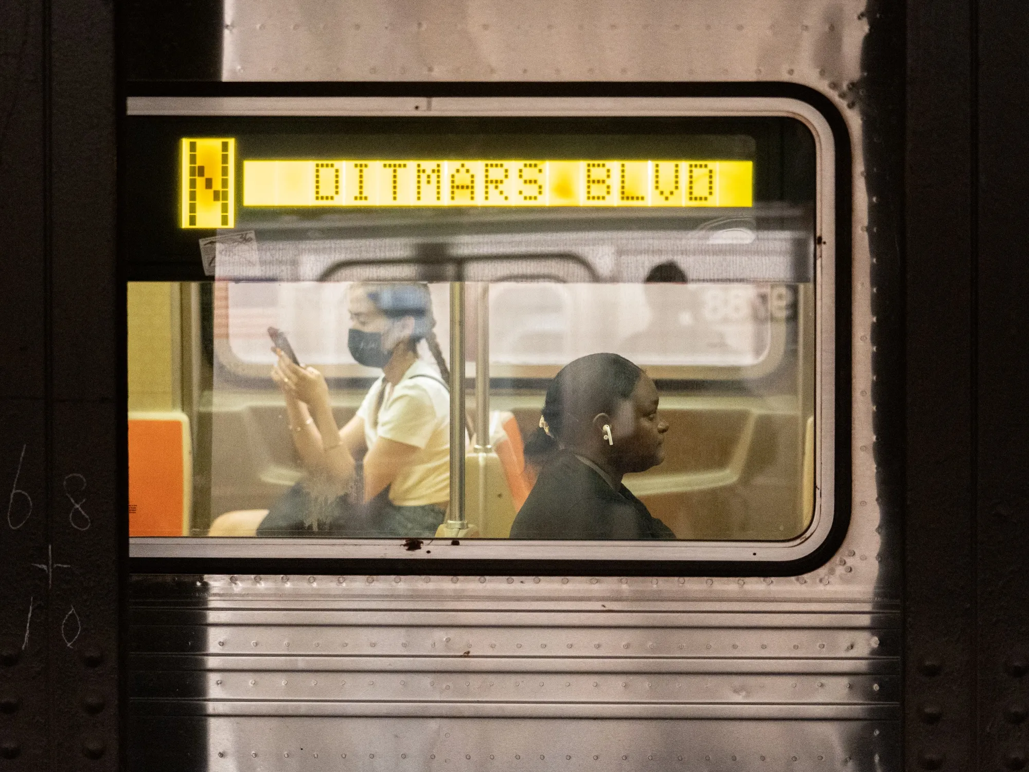 Commuters ride a subway in New York on&nbsp;June 30.