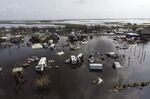 Damaged homes in floodwater after Hurricane Ida in Pointe-Aux-Chenes, Louisiana, on Sept. 2, 2021.