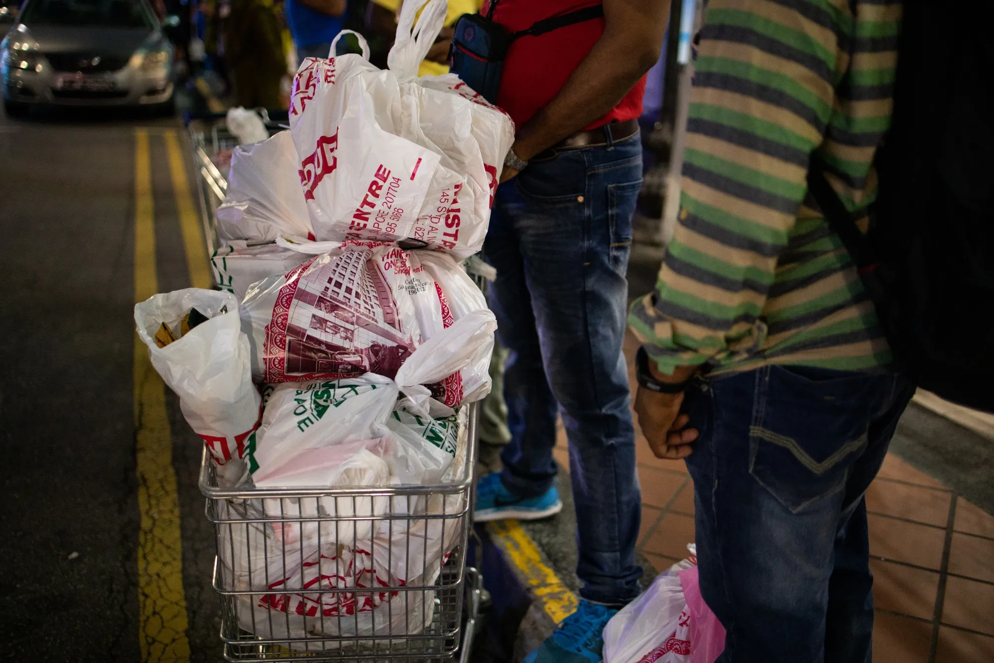 Plastic bags are still a way of life for shoppers in Singapore.